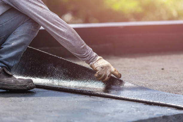 Professional Exterior Waterproofing technician working in Alpine, TN